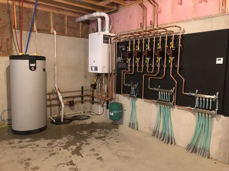 High-efficiency wall-hung boiler feeding five circulator pumps and radiant floor manifolds mounted on a black backer board.