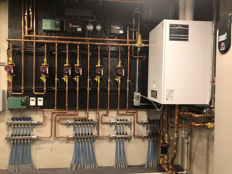 ACV Prestige boiler and indirect water heater connected by copper piping and zone circulator pumps.